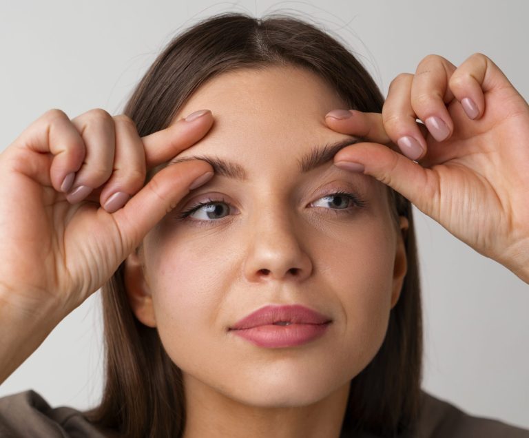 portrait-woman-trying-facial-yoga-massage-stay-young
